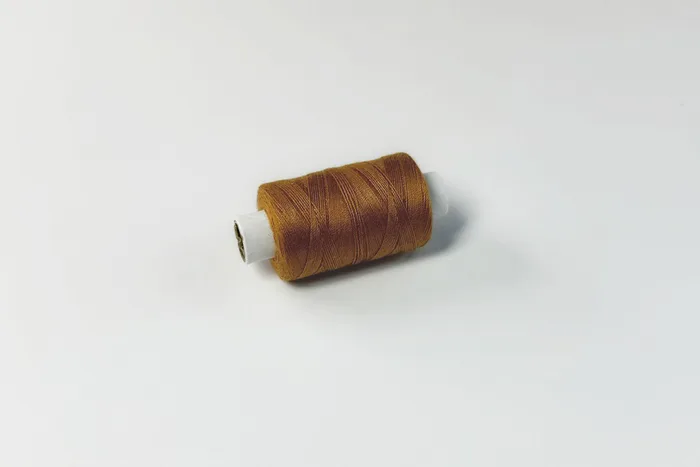 Нитки джинс ПЕ №20/3 150 м Barva, койот яскравий, 7033