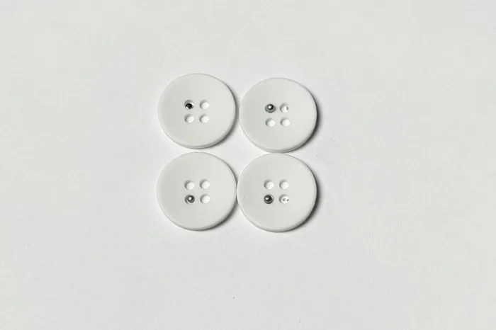 Гудзик 18 мм Mertbutton, білий, AVR-4-28-9999