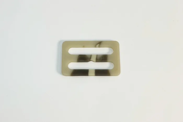 Пряжка 50 мм ПЕ Mertbutton, бежевий сірий